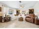 Bright living room with neutral decor and comfortable seating arrangement at 7460 Dickens Dr, Sarasota, FL 34231