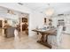 Inviting open-concept with dining room, kitchen, living and breakfast areas at 7460 Dickens Dr, Sarasota, FL 34231