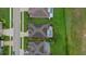 Bird's eye view showcasing homes with screened pools, well-maintained lawns, and lush landscaping at 7744 Castleisland Dr, Sarasota, FL 34240