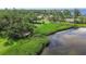 Aerial view of lush mangroves and a waterfront lookout point, highlighting the natural beauty at 7915 4Th W Ave # 7915, Bradenton, FL 34209