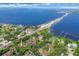 Breathtaking aerial shot showcases the property's prime location near the water and the scenic bridge at 7915 4Th W Ave # 7915, Bradenton, FL 34209