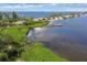 An aerial view features lush mangroves and water, emphasizing the natural coastal landscape at 7915 4Th W Ave # 7915, Bradenton, FL 34209