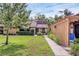 Charming single story home with lush lawn, mature trees and covered entrance at 7915 4Th W Ave # 7915, Bradenton, FL 34209
