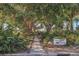 A private nature trail is surrounded by lush vegetation and features a 'no trespassing' sign at 7915 4Th W Ave # 7915, Bradenton, FL 34209