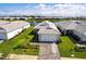 Charming single-story home boasts beautiful landscaping, a two-car garage and tranquil water views at 8148 Sternway Rd, Sarasota, FL 34240