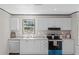 Charming kitchen features stainless dishwasher, range and bright cabinets at 8426 Sweden Blvd, Punta Gorda, FL 33982