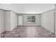 Inviting living room featuring natural light, vinyl flooring and neutral wall colors at 8426 Sweden Blvd, Punta Gorda, FL 33982