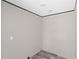 Empty room with luxury vinyl flooring and neutral wall color at 8426 Sweden Blvd, Punta Gorda, FL 33982