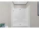 Bright shower stall featuring two seats and a modern shower head at 8426 Sweden Blvd, Punta Gorda, FL 33982