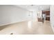 Open living space with kitchen and natural lighting with tile floor at 8437 Nandina Dr, Sarasota, FL 34240