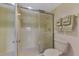 Bathroom features a shower with sliding glass doors at 96 Boundary Blvd # 127, Rotonda West, FL 33947