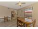 Dining area with a table and chairs, open to kitchen at 96 Boundary Blvd # 127, Rotonda West, FL 33947