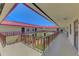 Exterior hallway view with open sky and multi-story buildings at 96 Boundary Blvd # 127, Rotonda West, FL 33947