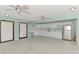 Spacious kitchenette with white cabinetry, modern appliances, and ample counter space at 96 Boundary Blvd # 127, Rotonda West, FL 33947