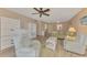 Bright living room with comfortable seating and built in storage at 96 Boundary Blvd # 127, Rotonda West, FL 33947