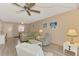 Comfortable living room with sofa, chairs, and dining area at 96 Boundary Blvd # 127, Rotonda West, FL 33947