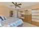 Large main bedroom features en suite bathroom and a full closet at 96 Boundary Blvd # 127, Rotonda West, FL 33947