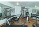 Well-equipped gym featuring weightlifting machines, free weights, and mirrors at 988 Blvd Of The Arts # 1016, Sarasota, FL 34236