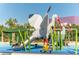 Fun bird-themed play structure with slide set amidst lush greenery, offering a unique recreational space at 988 Blvd Of The Arts # 1016, Sarasota, FL 34236