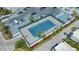 Overhead view of a tennis court next to a parking area at 988 Blvd Of The Arts # 1016, Sarasota, FL 34236