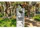 Scenic Mangrove Bayou Walkway lined with native plants, offering a tranquil escape into nature at 988 Blvd Of The Arts # 1016, Sarasota, FL 34236