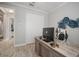 Inviting office space with hardwood flooring, large closet, and a stylish desk at 10423 Morning Marsh Ln, Parrish, FL 34219