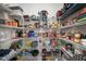 Well-organized pantry with shelving stocked with food items and small appliances at 10423 Morning Marsh Ln, Parrish, FL 34219