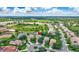 Beautiful aerial view of home on cul-de-sac with landscaping and pond views at 12710 Stone Ridge Pl, Lakewood Ranch, FL 34202