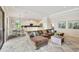 Open floor plan showcasing the living room, dining area, and kitchen at 12710 Stone Ridge Pl, Lakewood Ranch, FL 34202
