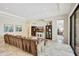Living room boasts recessed lighting, tile floors and access to other rooms at 12710 Stone Ridge Pl, Lakewood Ranch, FL 34202