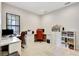 Bright office space featuring built-in desks, storage, and a large window at 12710 Stone Ridge Pl, Lakewood Ranch, FL 34202