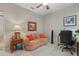 Functional home office with neutral decor and comfortable seating at 14216 Florida Rosemary Dr, Bradenton, FL 34211