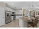 Spacious kitchen with white cabinets, granite countertops, and stainless steel appliances at 14216 Florida Rosemary Dr, Bradenton, FL 34211