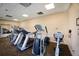 Well-equipped gym with treadmills, elliptical machines, and exercise bike, offering a convenient fitness solution for a healthy lifestyle at 1445 Gulf Of Mexico Dr # 203, Longboat Key, FL 34228
