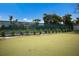 Well-maintained putting green, perfect for golf enthusiasts at 1445 Gulf Of Mexico Dr # 203, Longboat Key, FL 34228