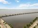 Aerial view showcases the bridge to the sea, situated closely to the property's location at 150 Harborside Ave # 307, Punta Gorda, FL 33950