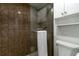 Bathroom features a glass enclosed shower with built-in shelving at 150 Harborside Ave # 307, Punta Gorda, FL 33950