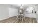 This dining space transitions seamlessly to the kitchen, complemented by a living room and multiple storage closets at 150 Harborside Ave # 307, Punta Gorda, FL 33950