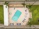 Aerial view of a beautiful, blue swimming pool in a condominium complex at 150 Harborside Ave # 307, Punta Gorda, FL 33950