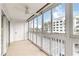 View of sunroom with a tile floor and windows overlooking outside area at 150 Harborside Ave # 307, Punta Gorda, FL 33950