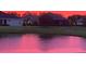 Lovely backyard view with serene pond and well maintained lawn at 1539 Ormond Ter, Parrish, FL 34219
