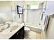 Bright bathroom featuring a tub-shower combination, framed art, and a single-sink vanity at 1539 Ormond Ter, Parrish, FL 34219