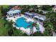 Beautiful community pool with lounge area and well manicured landscaping at 1539 Ormond Ter, Parrish, FL 34219