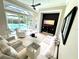 Cozy living room with a view of the pool area at 1539 Ormond Ter, Parrish, FL 34219