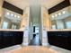This main bathroom features dual sinks, gorgeous cabinets, and ample counter space at 1539 Ormond Ter, Parrish, FL 34219