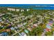 Aerial view of the home in a community near the water, highlighting surrounding neighborhood at 1862 Rita St, Sarasota, FL 34231