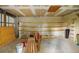 Spacious unfinished basement area with exposed ceilings and concrete flooring at 1862 Rita St, Sarasota, FL 34231