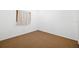 Compact bedroom featuring neutral walls and carpet flooring at 1862 Rita St, Sarasota, FL 34231