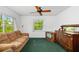 Cozy living room with a brown couch and wooden furnishings at 1862 Rita St, Sarasota, FL 34231