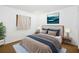 Beautifully furnished main bedroom with plush bedding and ambient lighting for a relaxing atmosphere at 1862 Rita St, Sarasota, FL 34231